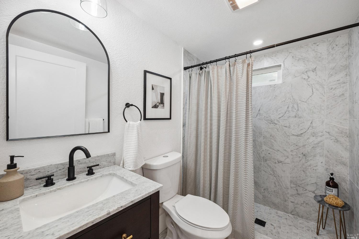 San Rafael Fixer bathroom by bay design + remodel